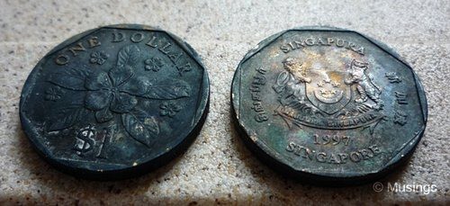 Two-1-coins-found-in-washing-machine-after-4-years-online