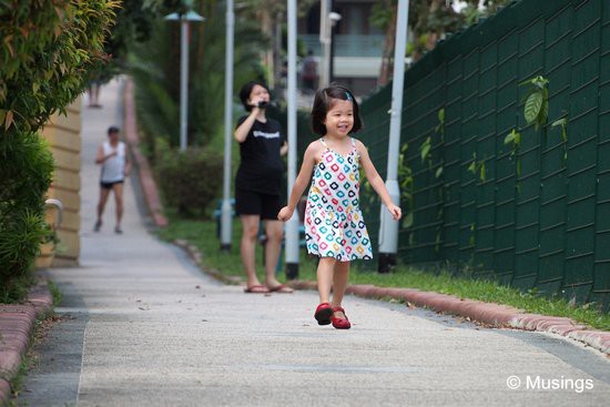 On every occasion we've shot from the stretch of pavement that's between the site and HDB blocks, Hannah enjoys running up and down the stretch.