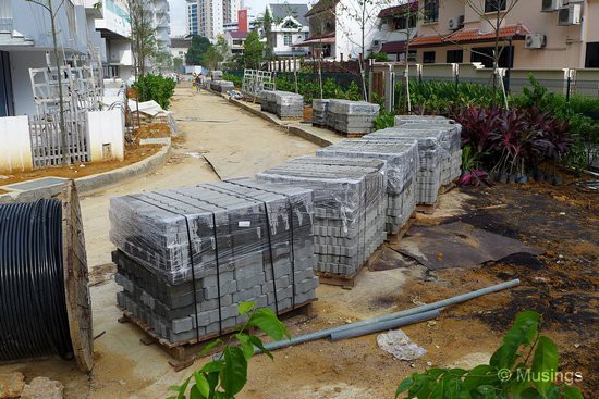 Crates of cobblestone ready to line the driveway.