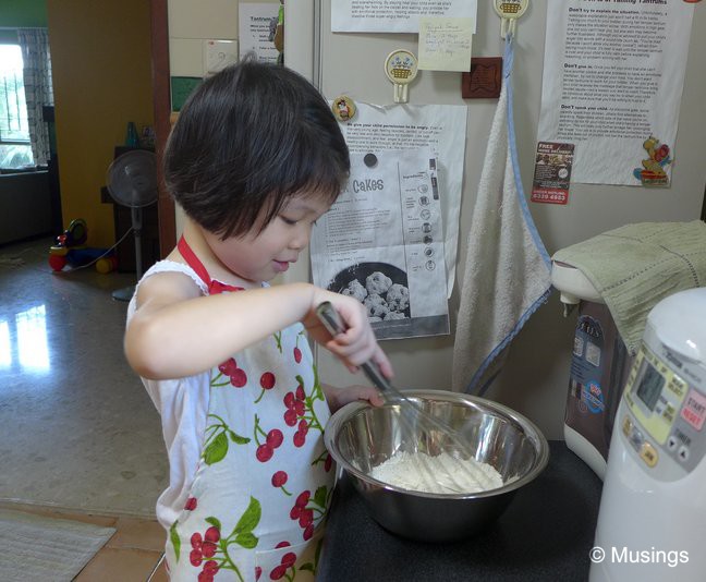 Whisking the flour, baking powder and salt together.