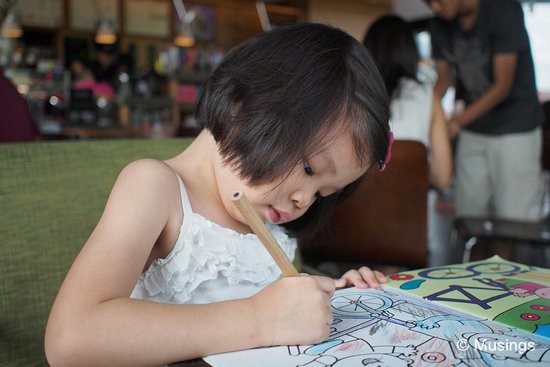 Hannah with her weekend coloring activities over brunch at Coffee Bean/Tea Leaf.