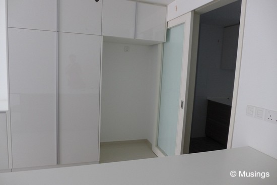 The Dry Kitchen, alongside storage compartments and also a space for a fridge.