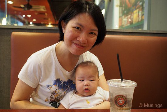 Peter can't take his eyes of Mommy's lychee-flavored soda at Pastamania @ Hougang Mall. Taken at 17mm f2.0