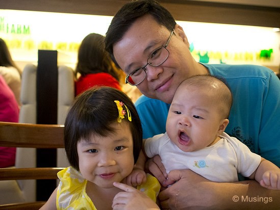 The kids and Daddy. Half of every picture with Peter will see a trickle of his drool either collecting at his lips, or already in a puddle on someone's hand! Taken at 17mm f1.8.