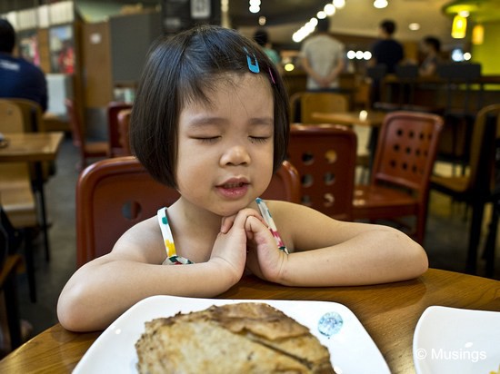 Saying Grace for her mushroom-pie thingie at Starbucks @ Hougang Mall. She still ends her prayers with "Thank you God for Daddy, Mommy, Peter, and Hannah!"