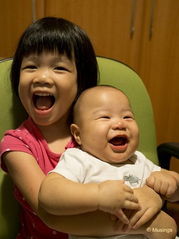 Hannah loves to interact with Peter, though in this picture, Mommy is just off-camera getting Peter to laugh!