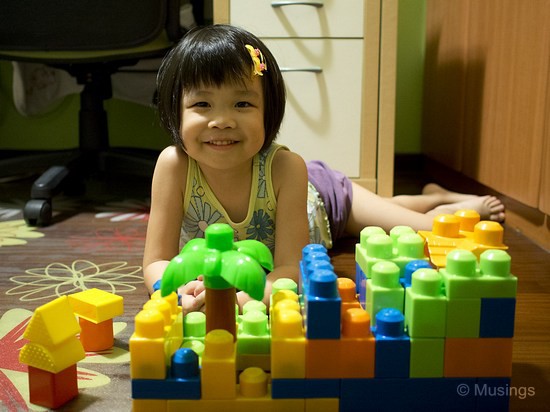 Hannah asked for a picture to be taken of her latest home-building project using megablocks. Taken at 17mm f1.8.