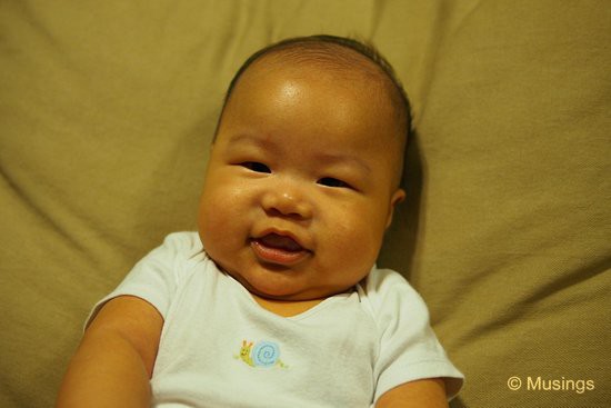 The life of a 3.5 month old; eat, sleep, poop, cry, and be happy (occasionally).