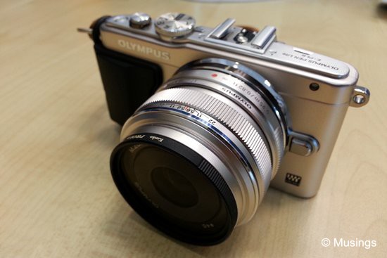 The new E-PL6, silver-edition, coupled with the 17mm f1.8 lens. 