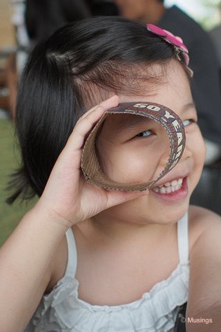 4 Years 1 Month in July 2013. The cup sleeve at Coffee Bean is a toy too.