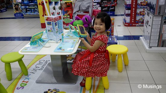 Hannah has quite taken to the child-oriented Samsung Galaxy Tab 3 for kids; this was at Toys R' Us at Tampines Mall on Tuesday. I'm a little tempted to get this for her - it's really loaded up the gills with child-friendly applications, several of which are quite educational. 