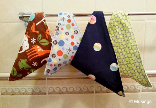 4 different fabrics used for Peter's 15 bibs.