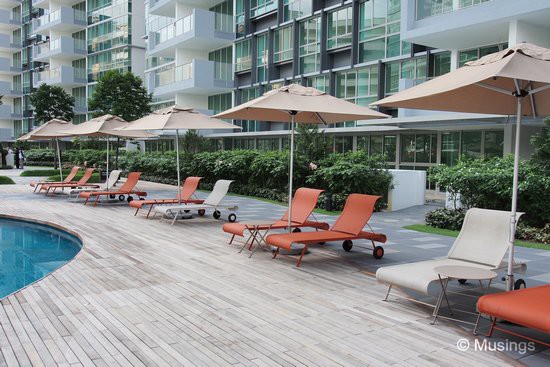 Deck chairs beside the main pool. Just a few weeks ago, strong winds during a monsoon storm blew one of these into the lap pool. 