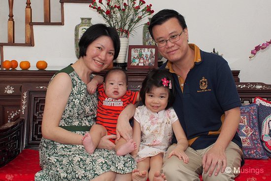 Our yearly CNY picture. Peter is still struggling to break free.