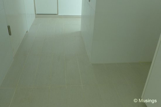 Kitchen tiles looking all good now. A month ago, there were numerous chips all over the floor.