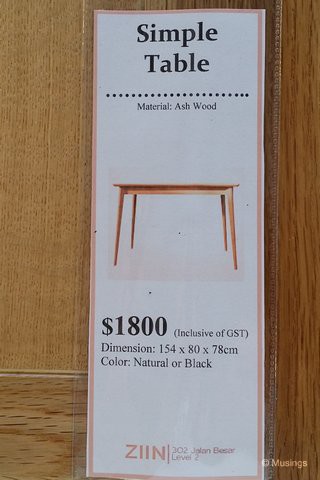 The descriptor and price tag of the table.