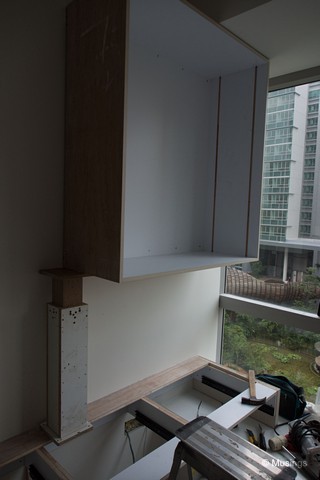 Wall-hung cabinets in our workroom. They were a lot taller than we'd envisioned from the earlier 3D render.