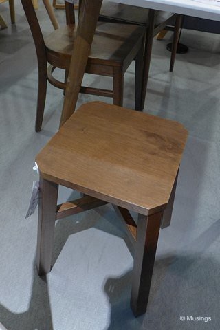 'Tang' wooden stool in cocoa finish. We bought two of these and will be additional seating if we have more than four persons at the table.