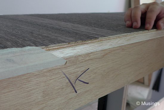 This is a close-up picture of the veneer laminate for our king-size bedframe. This solution as described in our earlier post was quite a bit more costly than the normal laminate surfaces, and Ling accompanied our designer to the factor in fact to select the laminate surface. We were very surprised to see how thick the laminate was indeed. The texture on the surface was also quite deep, providing for a an almost wood-like feel of the surface.