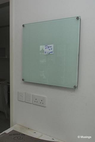 Our glass writing board. Our designer found a contact point to do a small one for us. This will be our space for us to scribble "Menu for the day", and "Household Chores Roster".:)