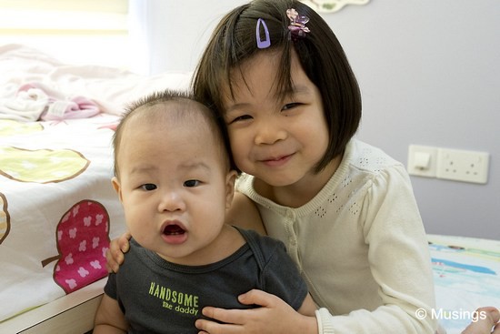 The two kids enjoy each other's companies; especially Hannah who almost a year in still loves to play with her little brother. 