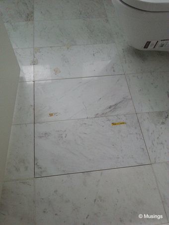 Newly laid tiles in the master bathroom. Not quite exactly the same tone, but at least no chipping.