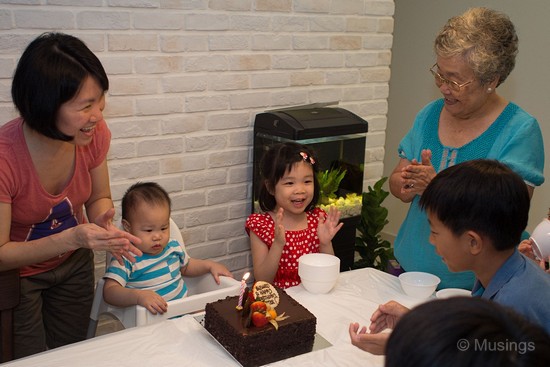 Peter more interested in his birthday cake than the singing.:)