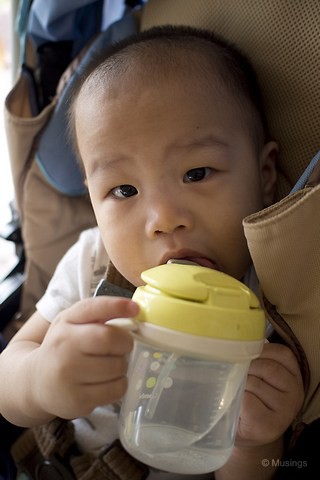 Getting Peter to learn to drink from a sippy cup. Ling thought this might help Peter transit to learn to speak words. 