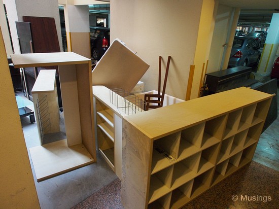 The bulk furniture at the basement carpark awaiting for the handymen to cart them over to the bulk disposal point. Most of these in the picture here were from Ikea. 