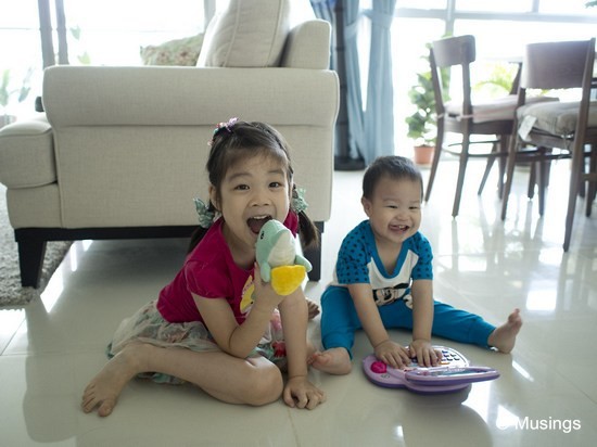 Kids at home on weekends. The two of them play a lot together, though Peter often seems contend to follow his sister's lead.