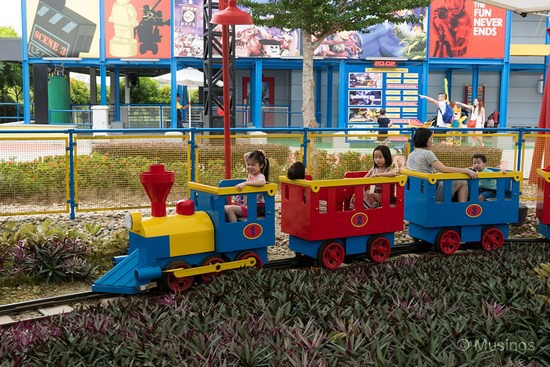 Miniature train ride. This one runs on a small circuit sitting inside a large tent. 
