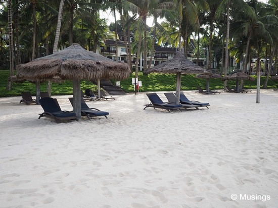 Powdery white sand, with enough deck chairs to go around. 