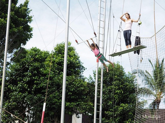 She liked the trapeze so much that she did this three times, and even (nearly) accidentally jumped queue in her enthusiasm!